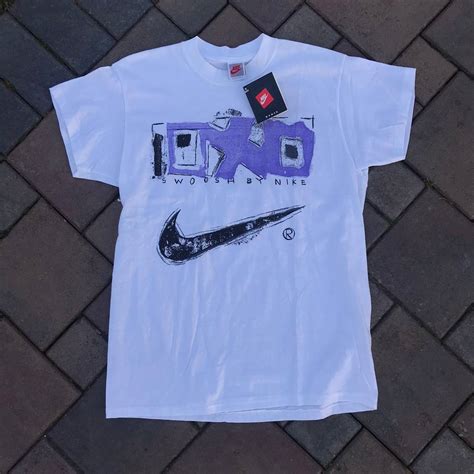 Get Retro Style with Vintage Nike Graphic Tees for Men and Women